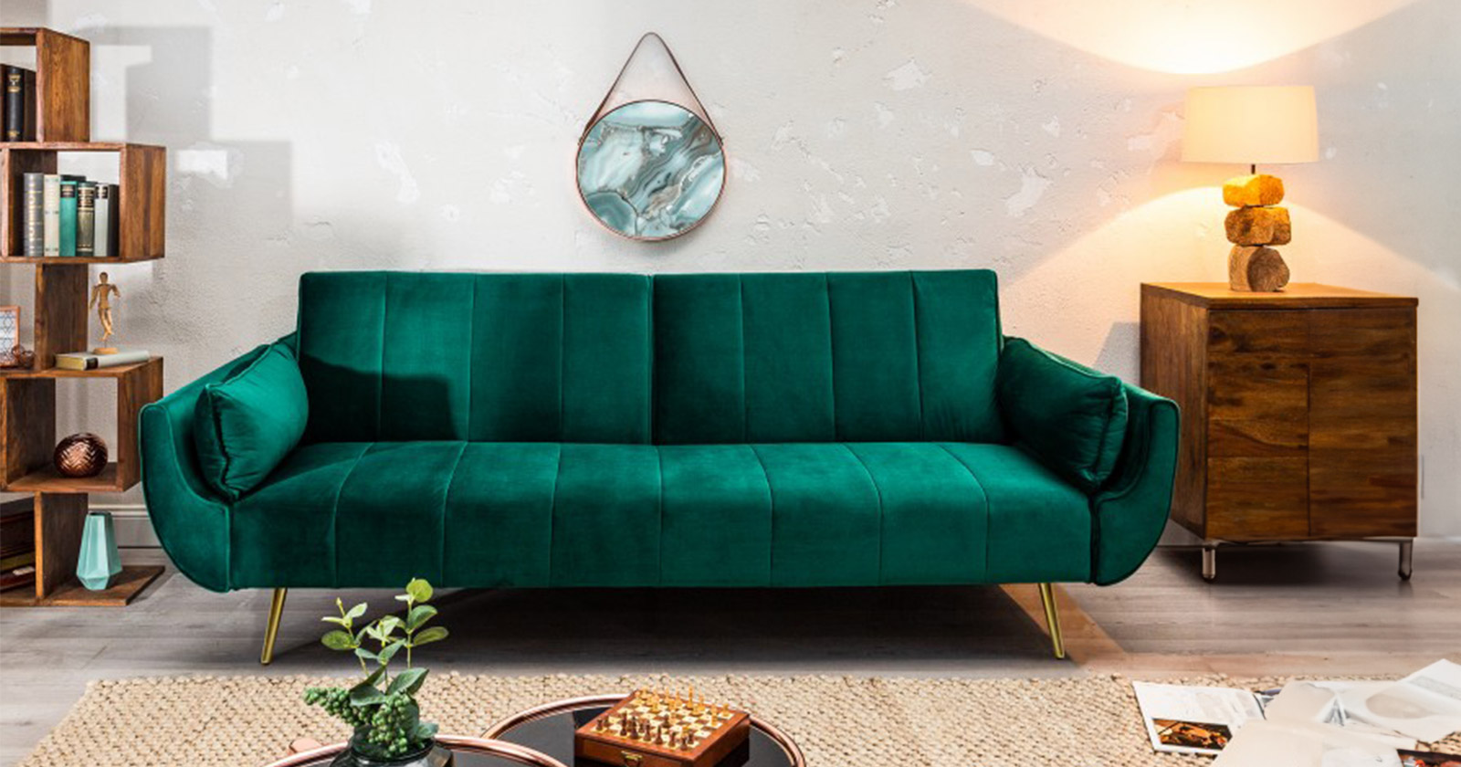 duża sofa rozkładana w kolorze butelkowej zieleni